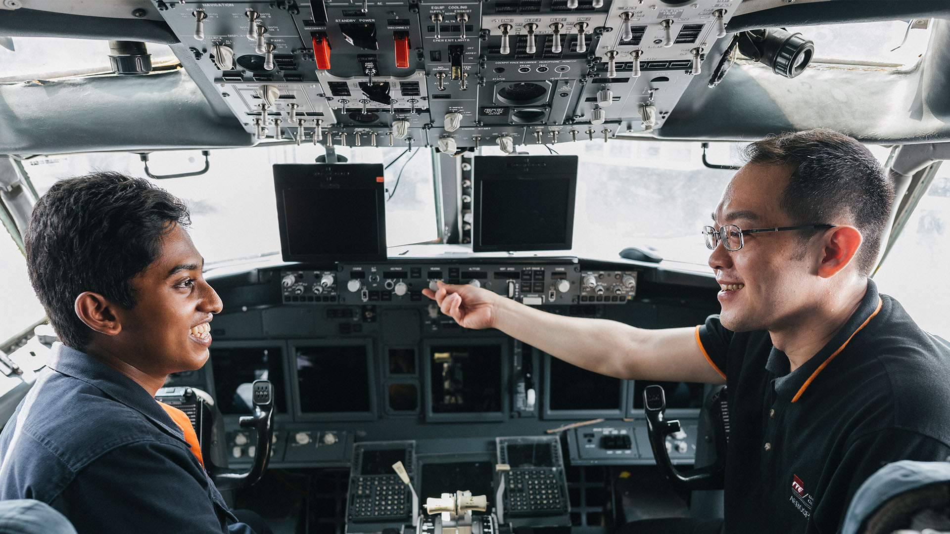 A Lecturer and Student in an Aircraft Training Session